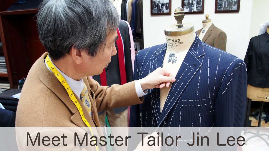 Master Tailor Jin Lee fitting a hand-basted pinstripe jacket on a mannequin in his Indianapolis studio